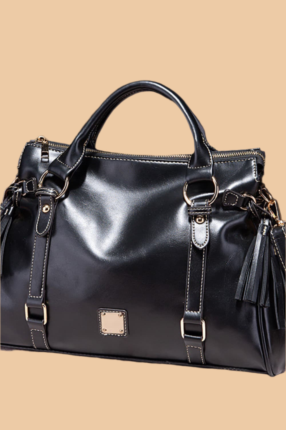 Leather Handbag with Tassels.